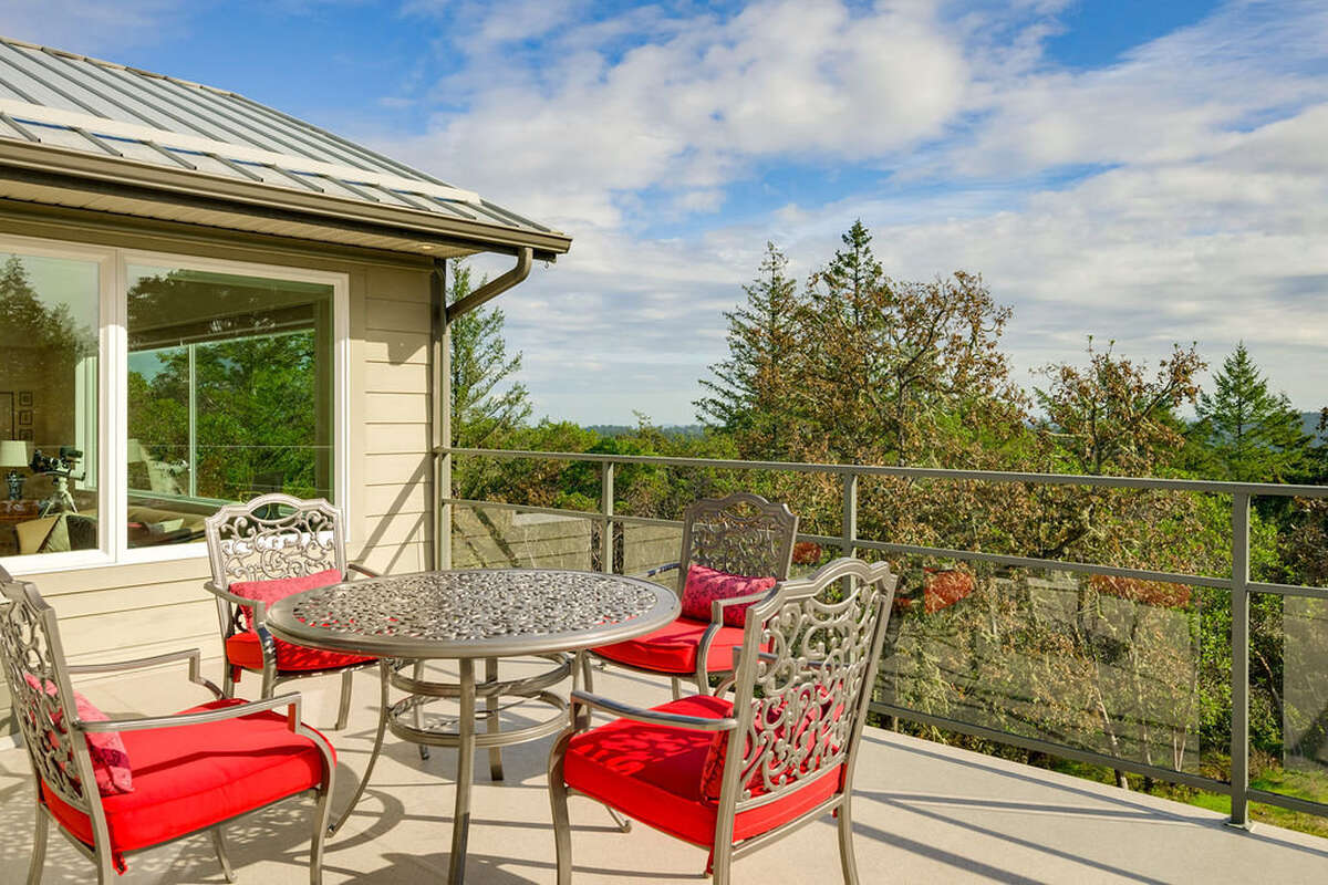 East deck - favourite place for breakfast - may be enclosed with shade fabric in summer