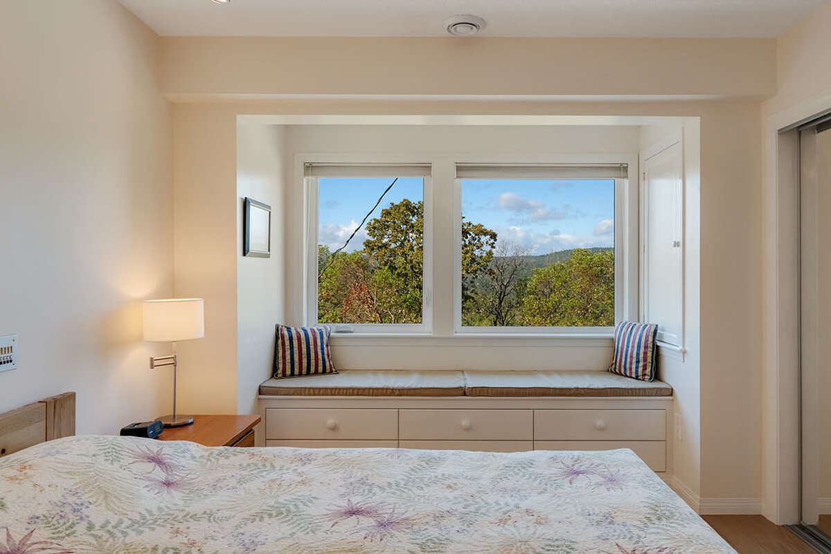 Windows to the west, window seat with drawers and linen closet