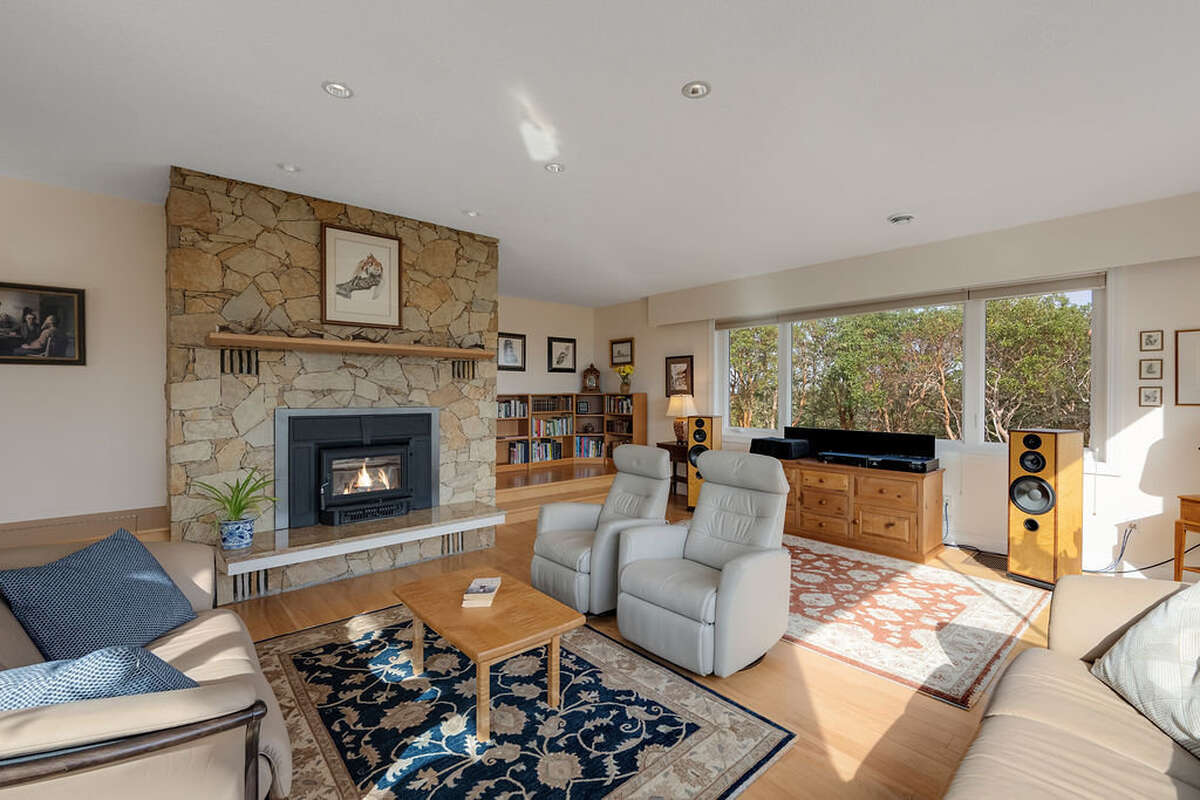 The area by the window can be used for more formal dining if desired