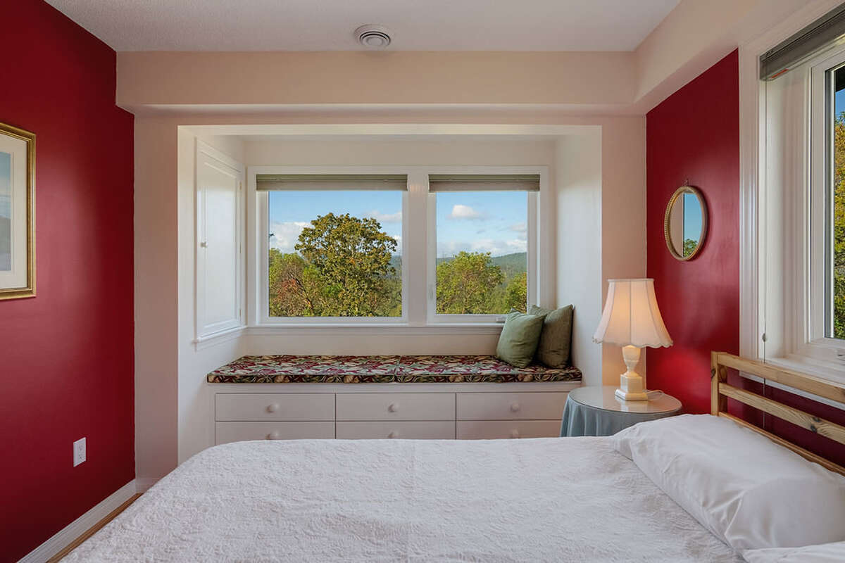 Linen closet and window seat with drawers