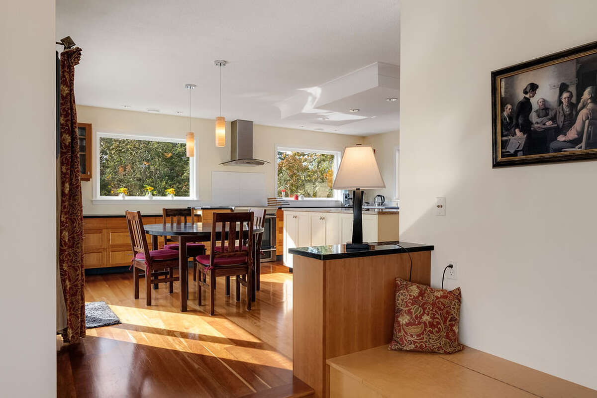 Dining room with solid cherry flooring, custom milled by Westwind Hardwood