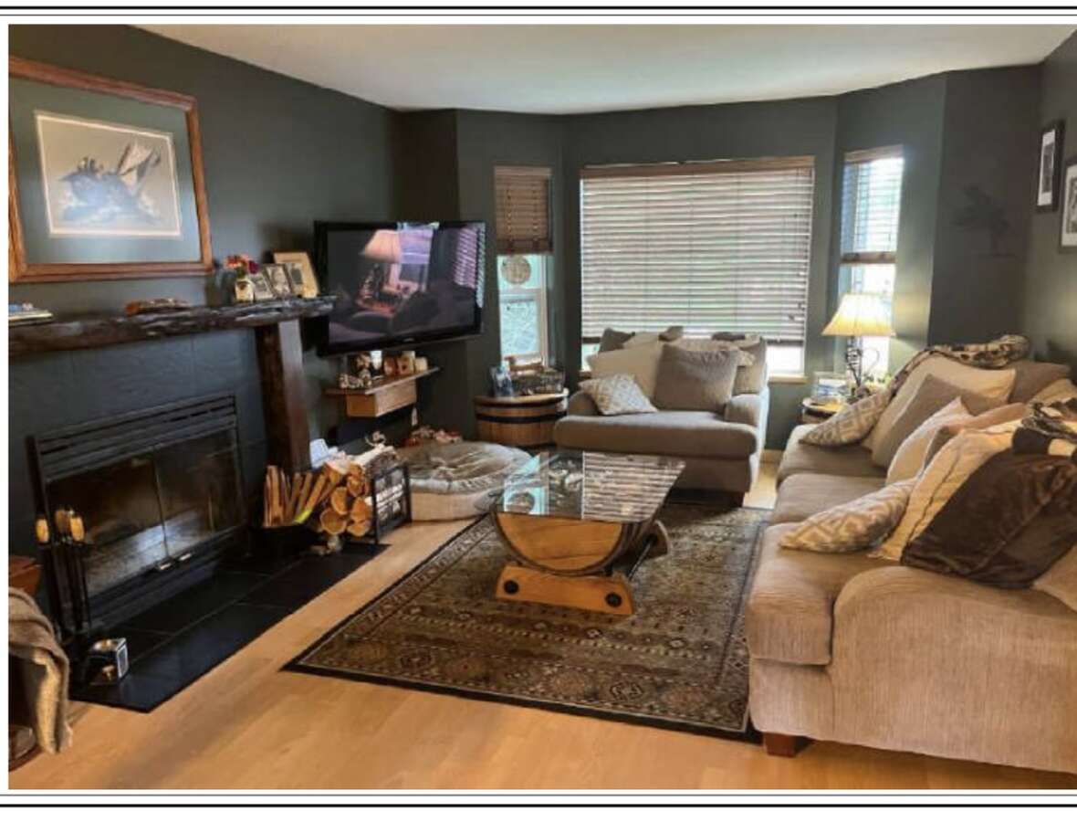 living room with natural fireplace