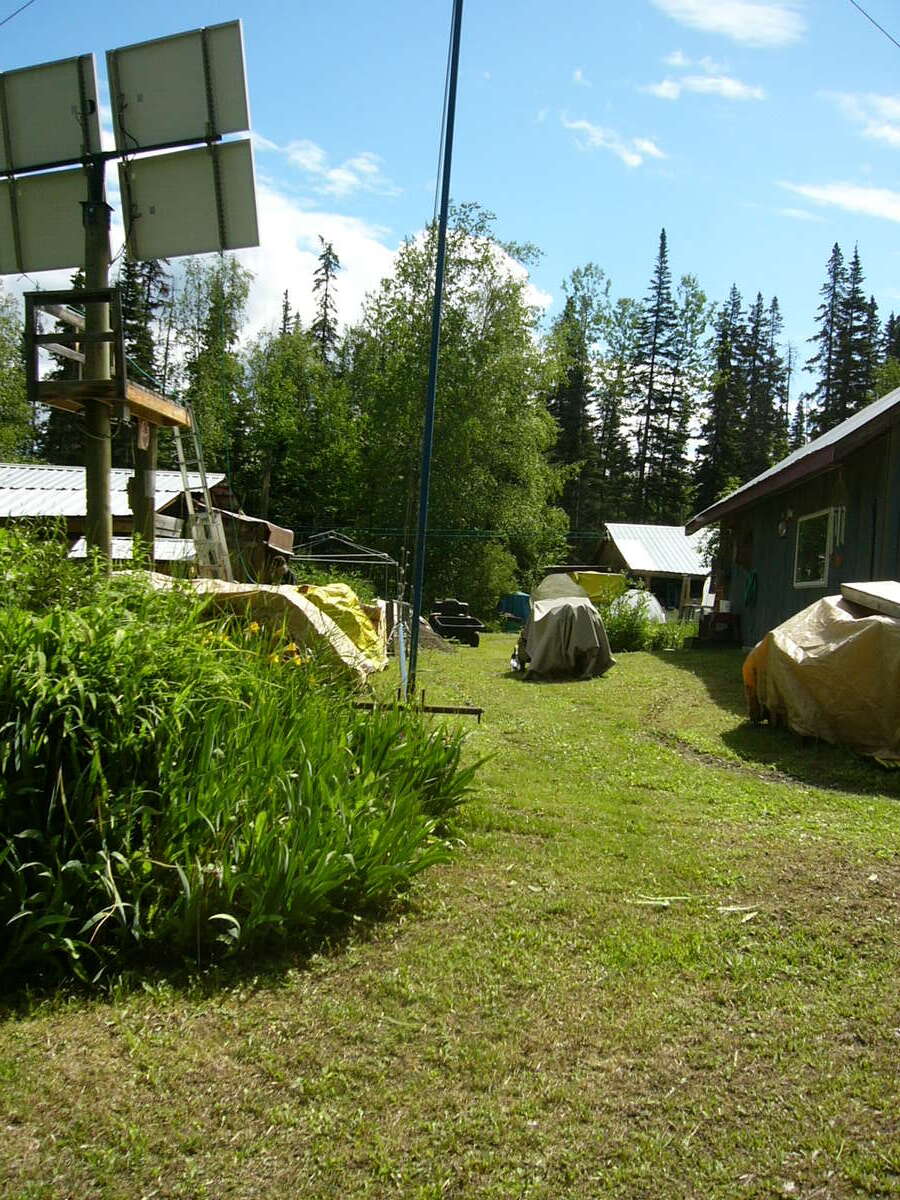 area has been built up and leveled for 14x32' greenhouse, woodstove to go with it.