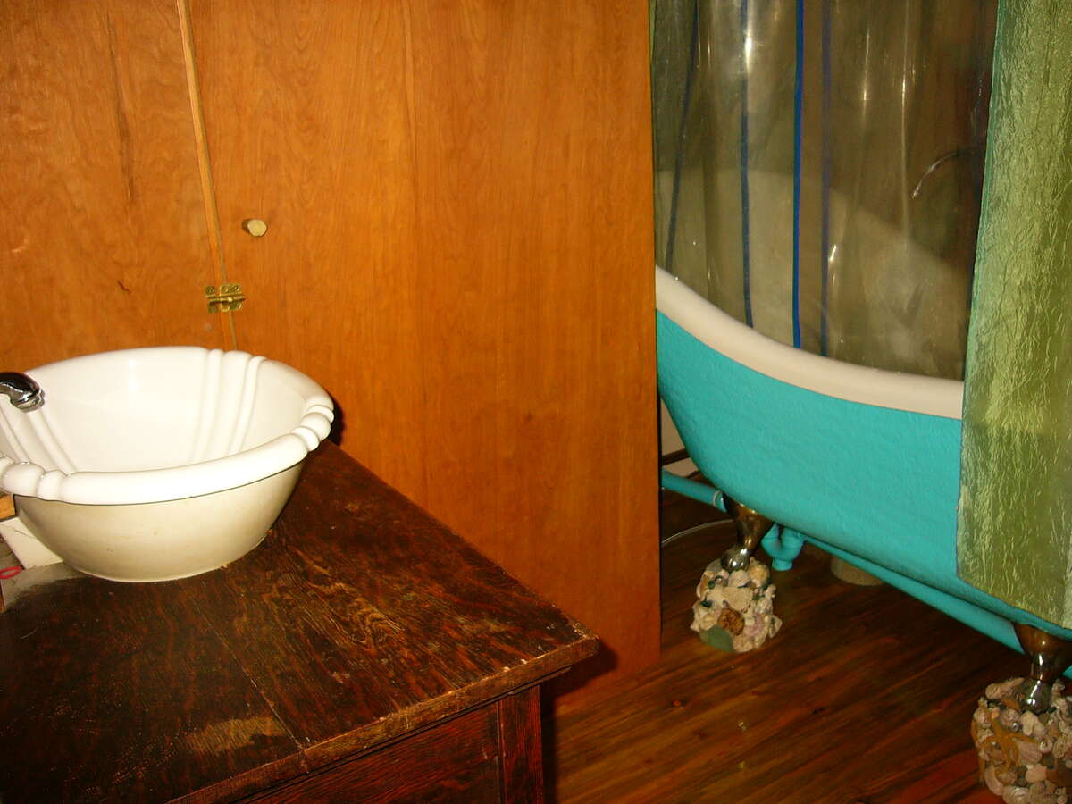 Replica fiberglass tub/shower.