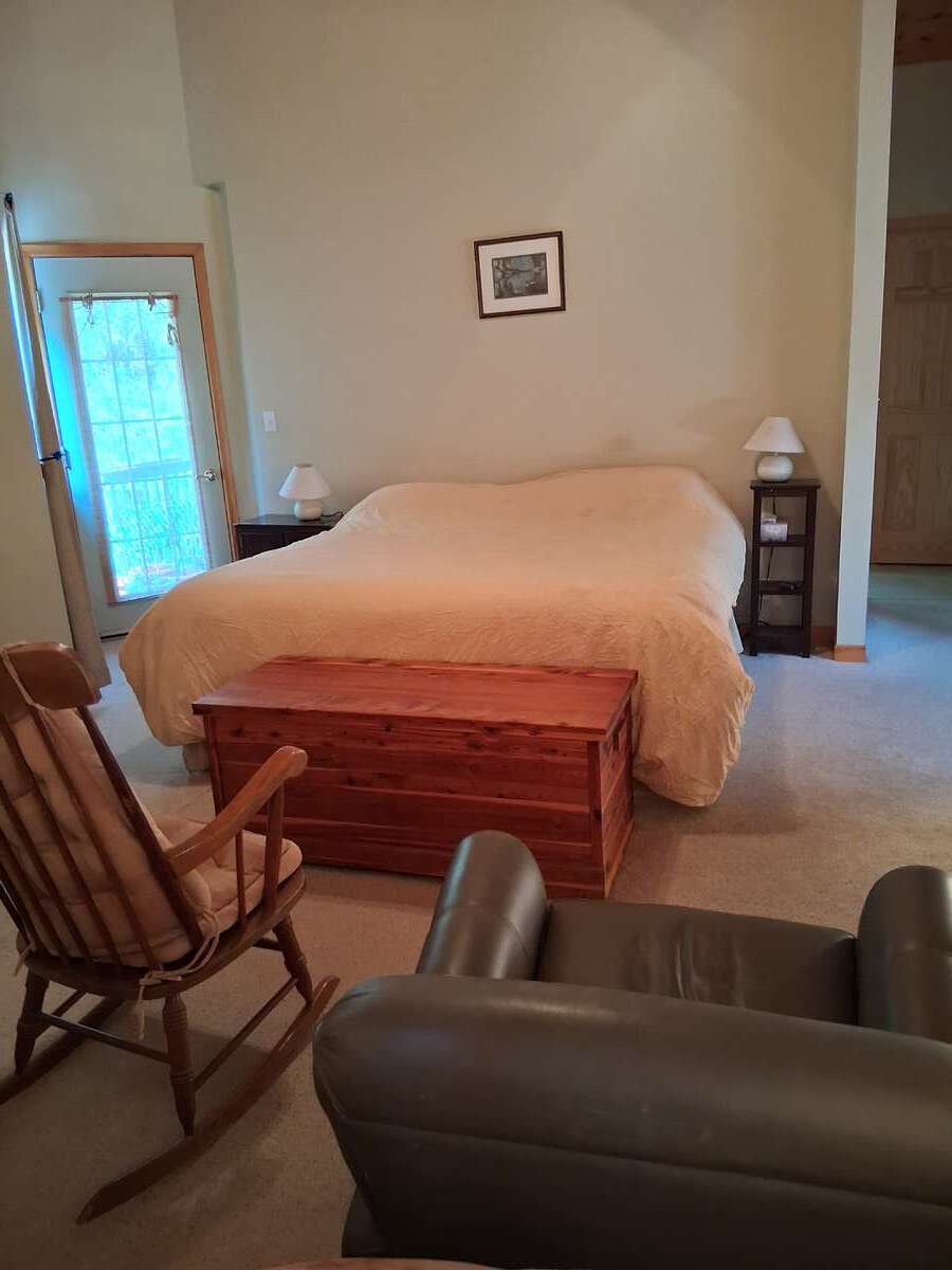 This is my room! King size bed and a walkout balcony to some of my vegetable plants.