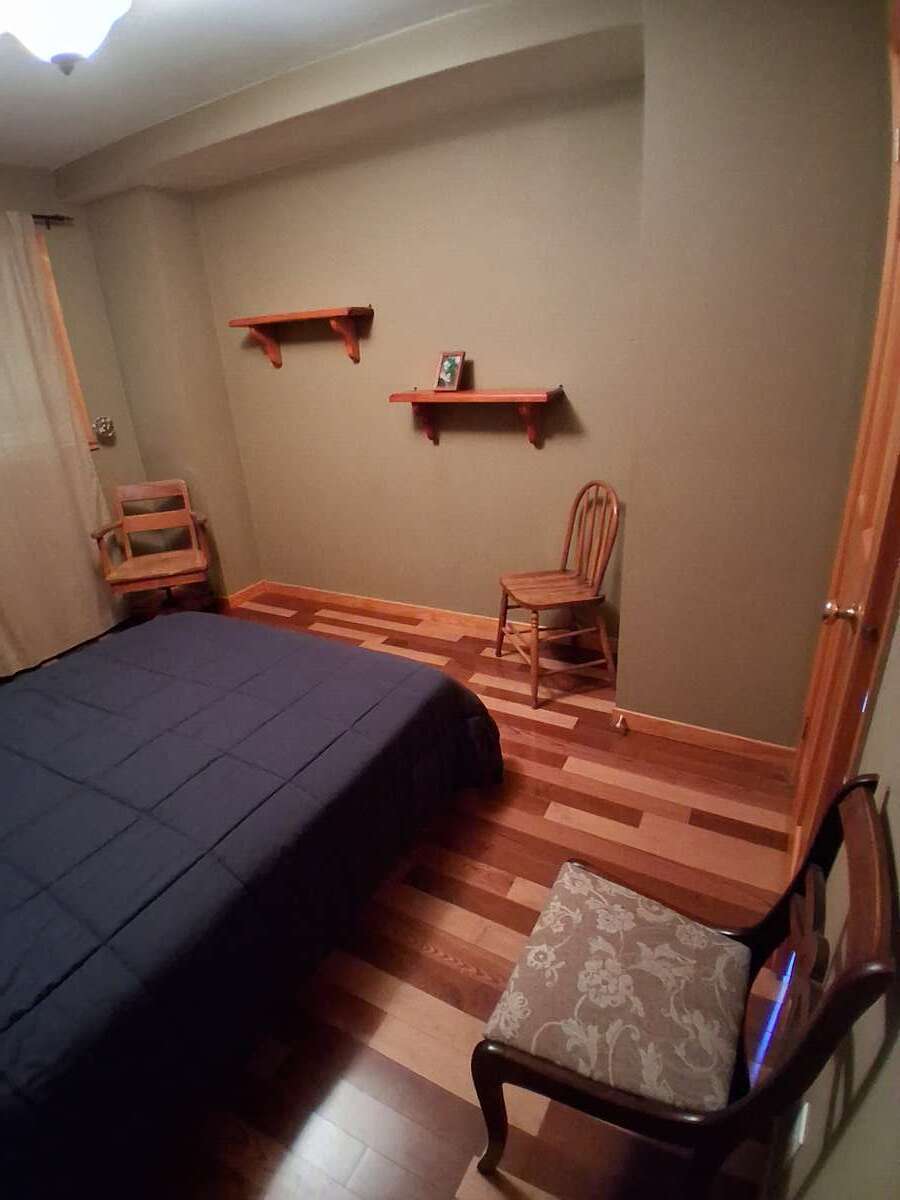 The other end of the cozy bedroom.