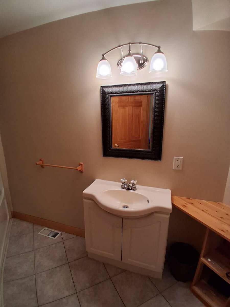 Main floor washroom. Yes there is a bath with a shower!
