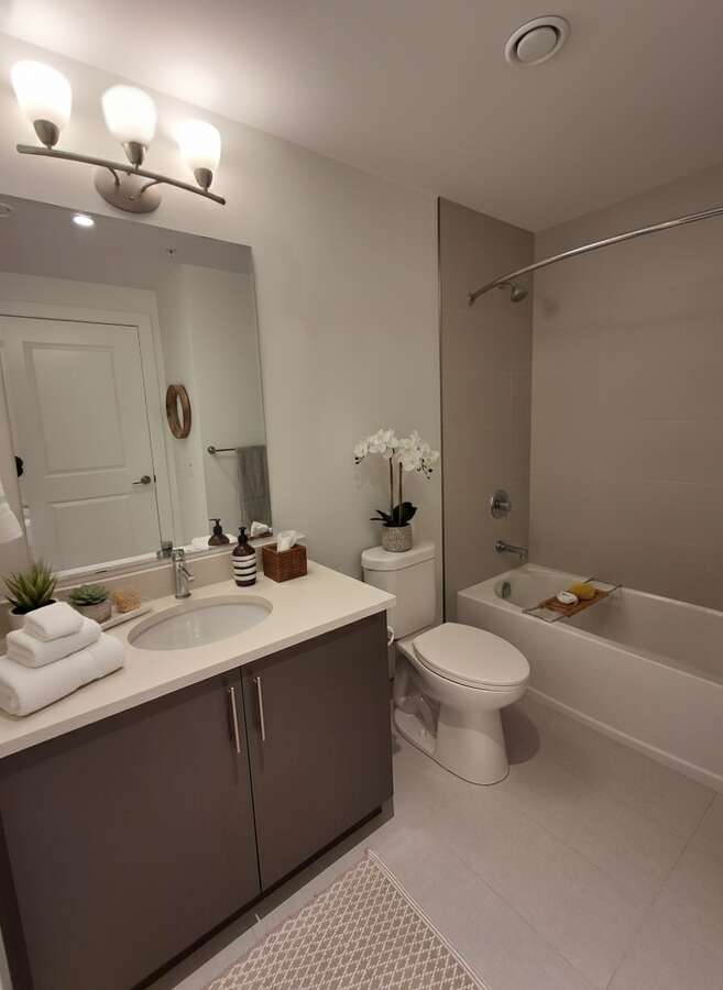 Bathroom with oversized mirror