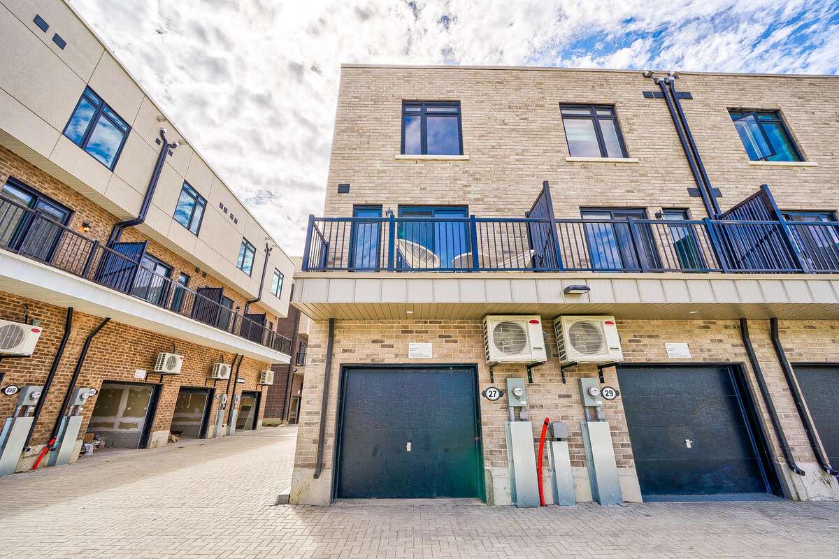 Immaculate Corner Unit Townhome in Prime Location