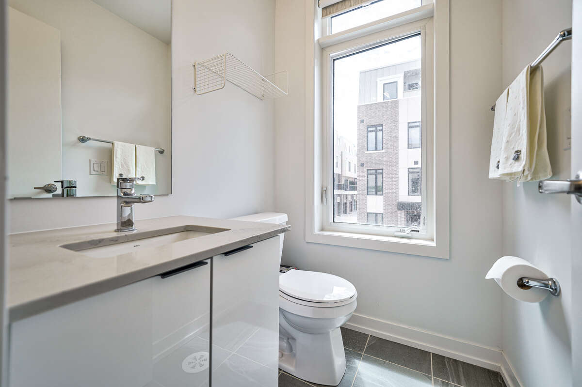 Immaculate Corner Unit Townhome in Prime Location