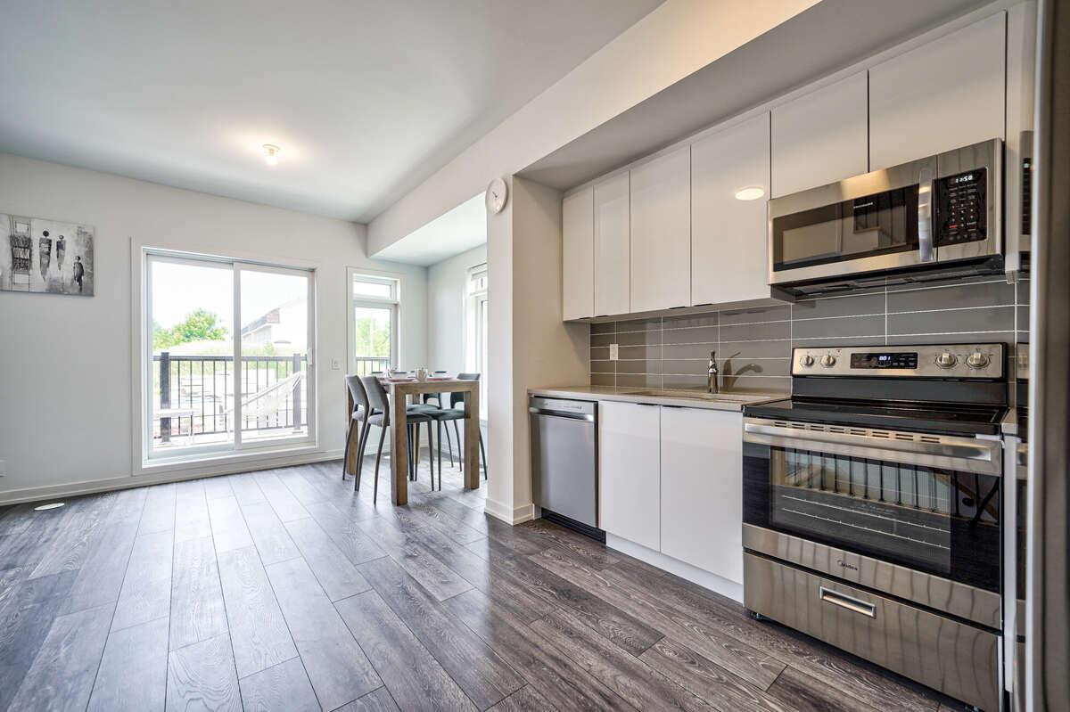 Immaculate Corner Unit Townhome in Prime Location