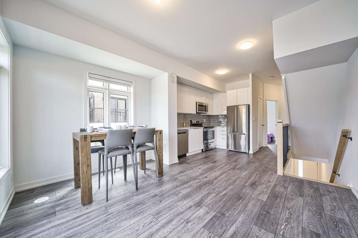 Immaculate Corner Unit Townhome in Prime Location