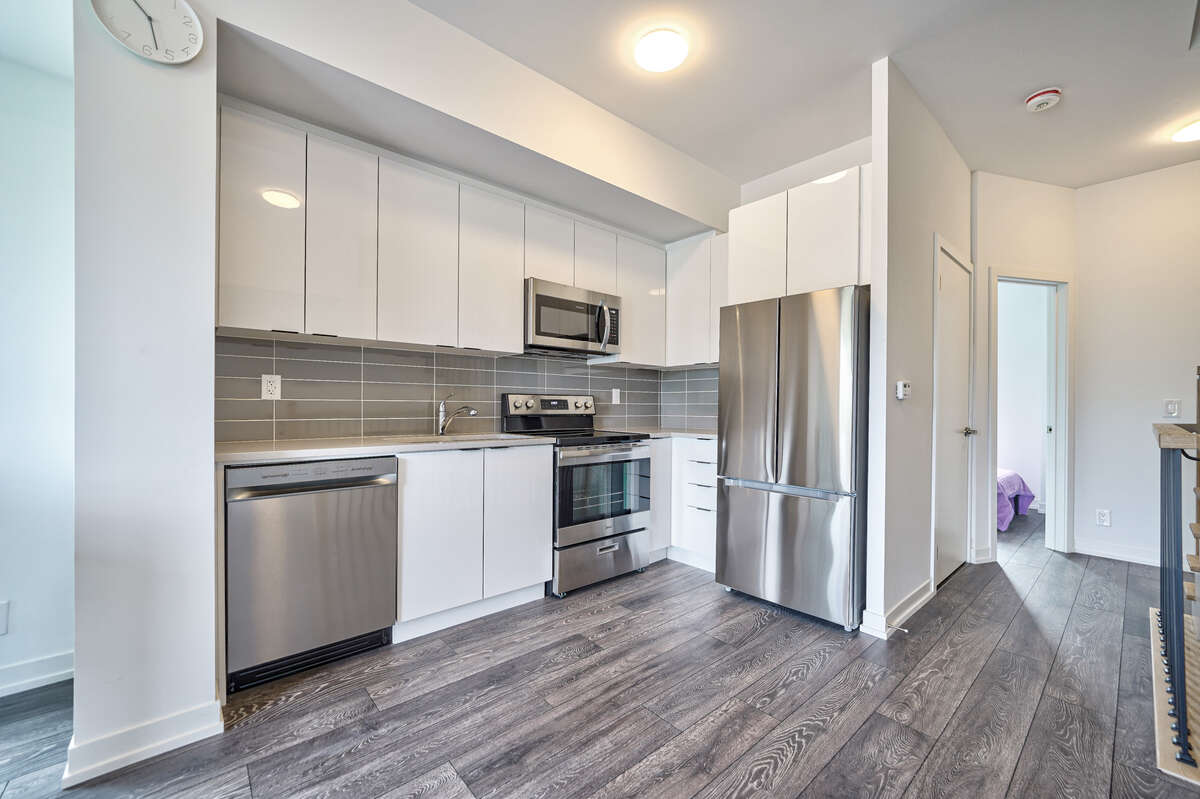 Immaculate Corner Unit Townhome in Prime Location