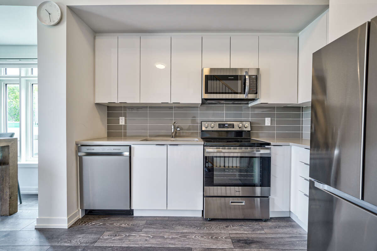 Immaculate Corner Unit Townhome in Prime Location