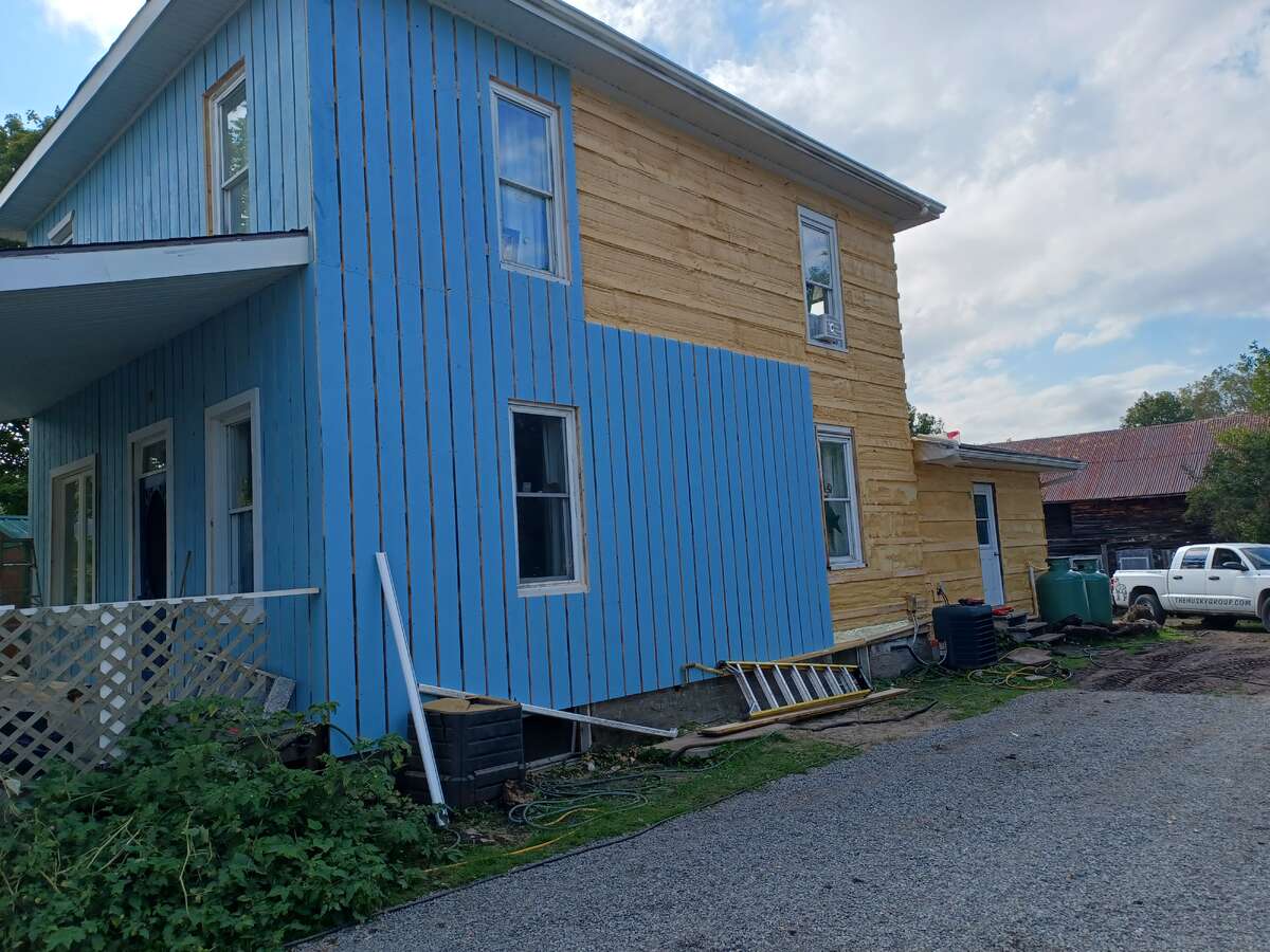 Gravel drive & siding over 1 1/2" insulation