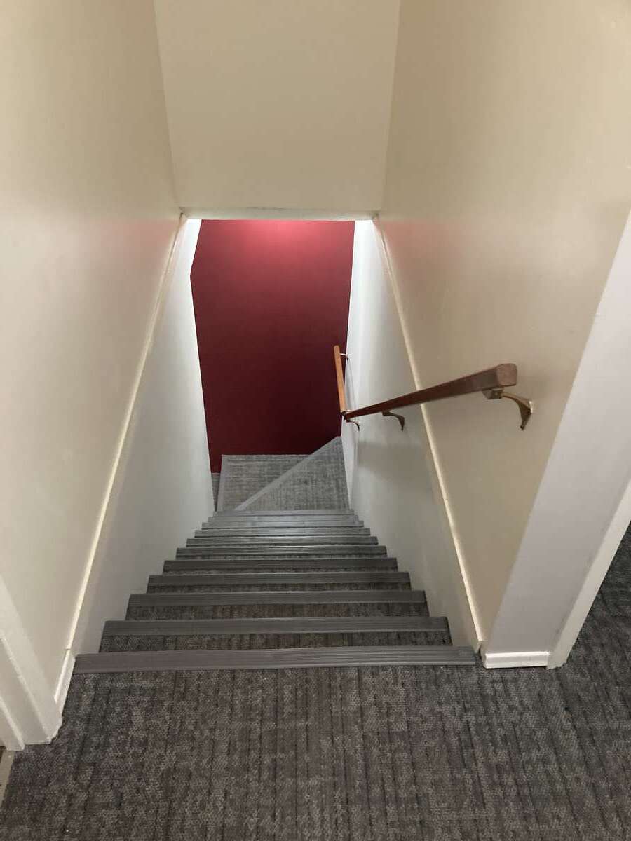 Stairs to dining and kitchen