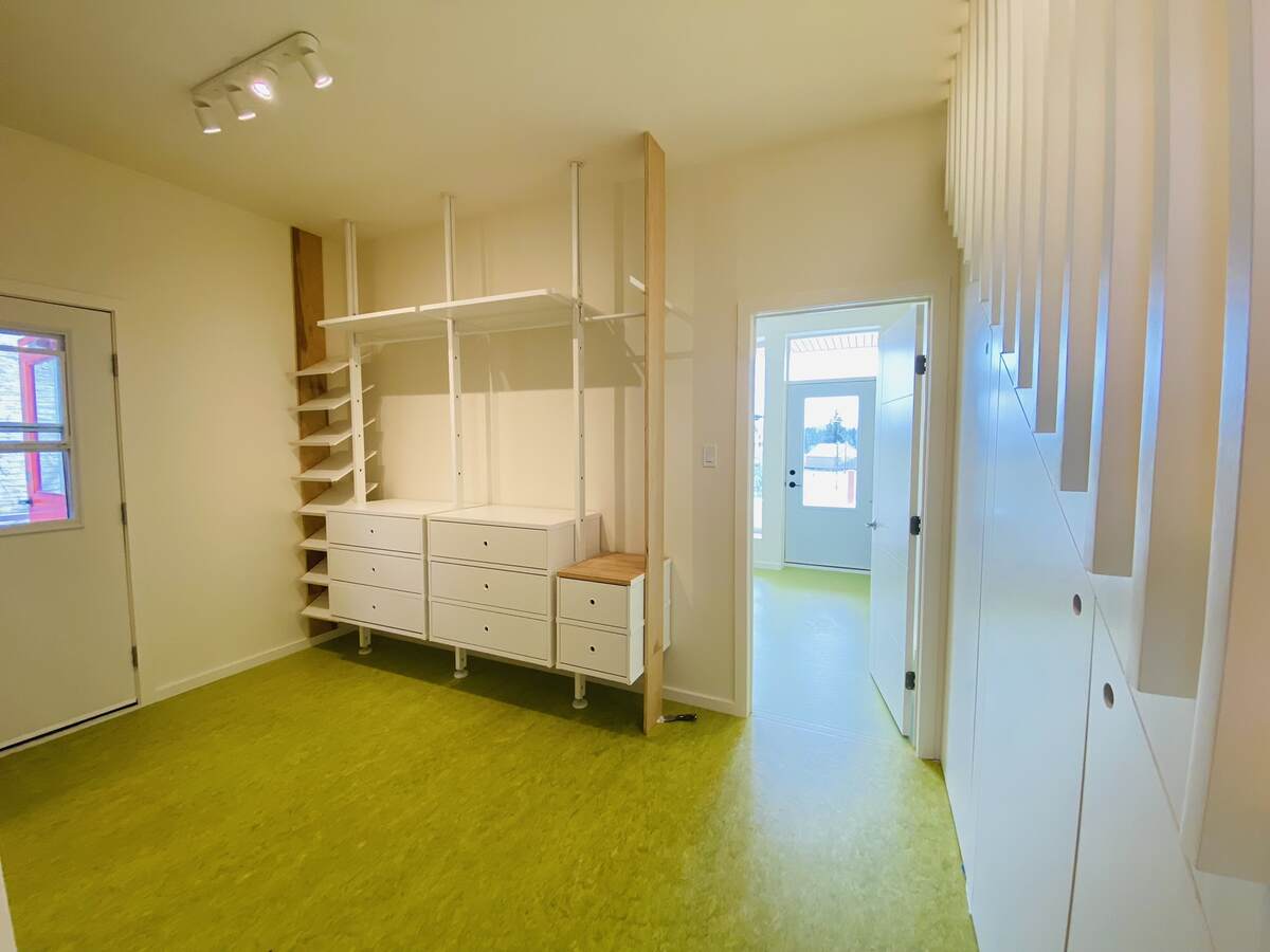 Front entry looking into back bedroom which has a large balcony.