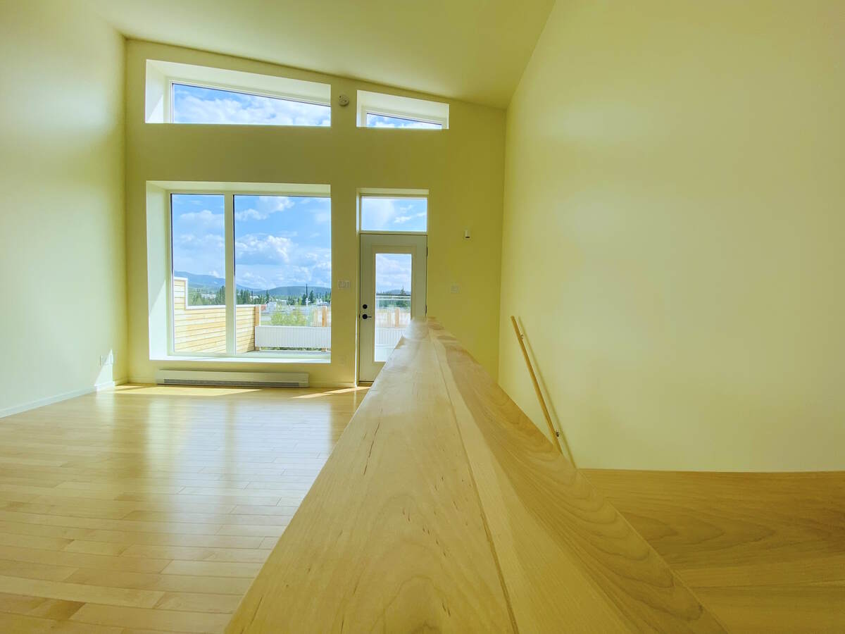 Hand-milled birch balustrade detail.
