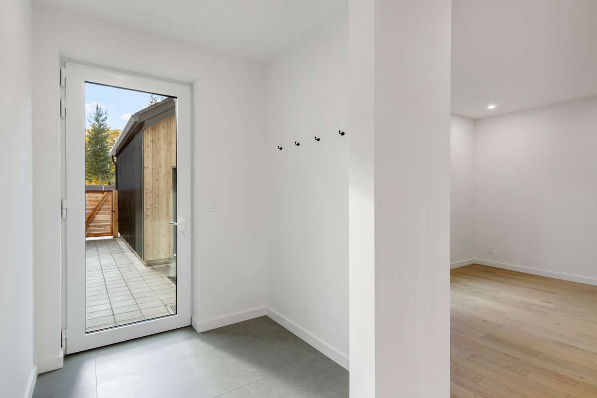 Own your own strata free townhome with backyard