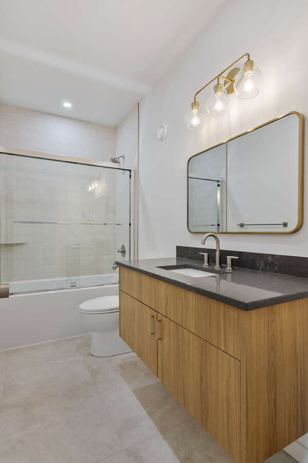 Own your own strata free townhome with backyard