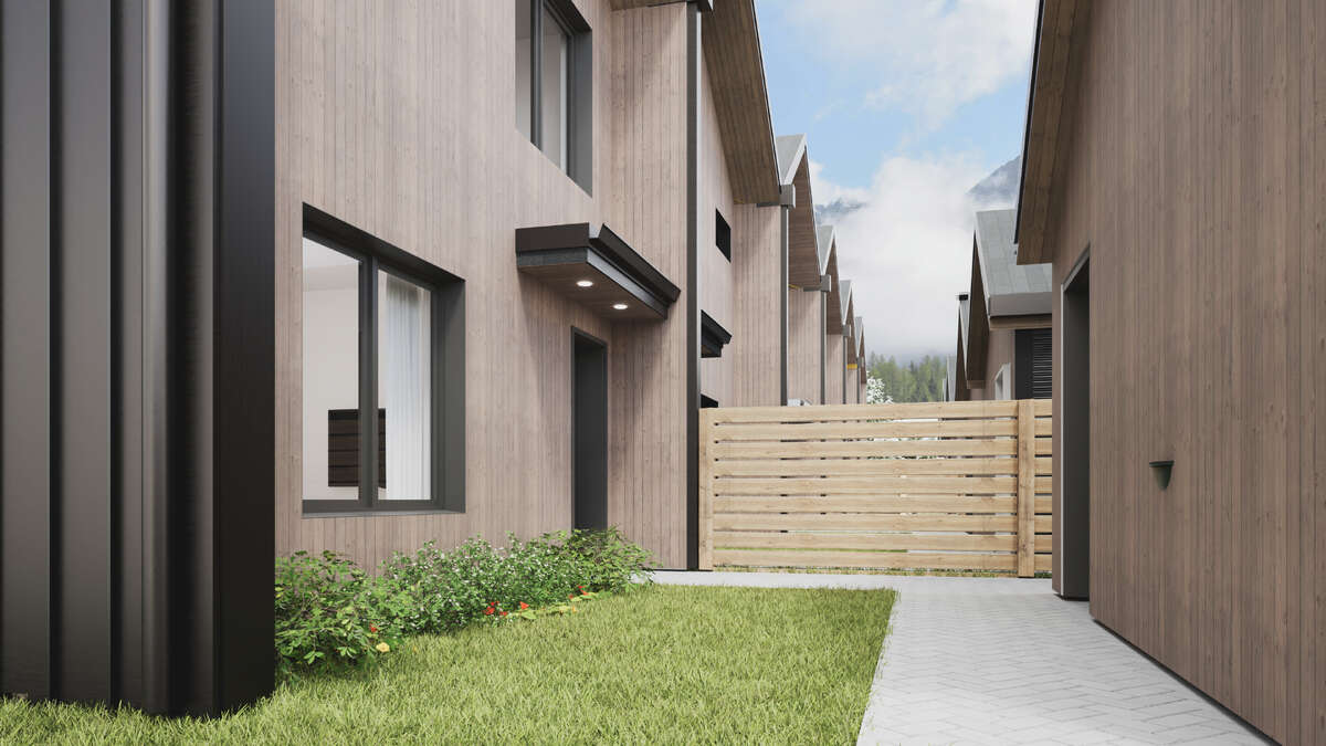 Own your own strata free townhome with backyard