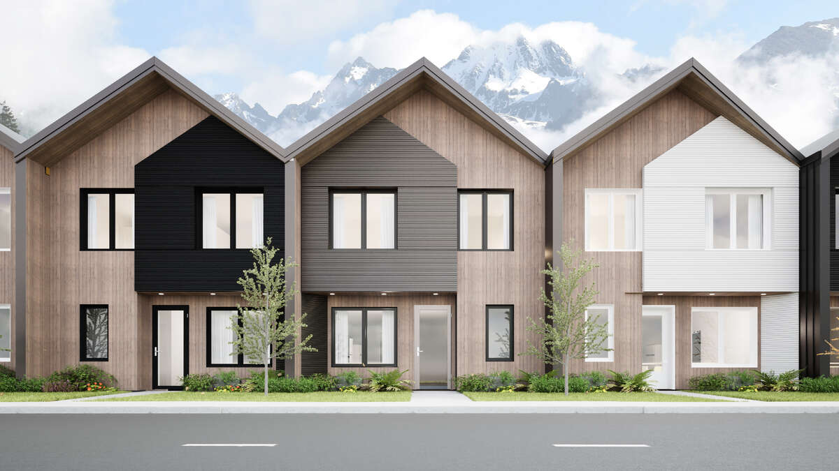 Own your own strata free townhome with backyard