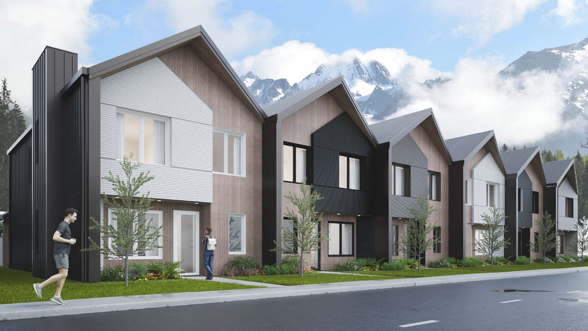 Own your own strata free townhome with backyard