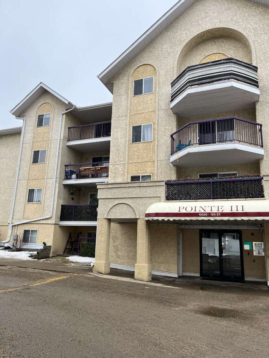 Unit located top floor center left in picture.