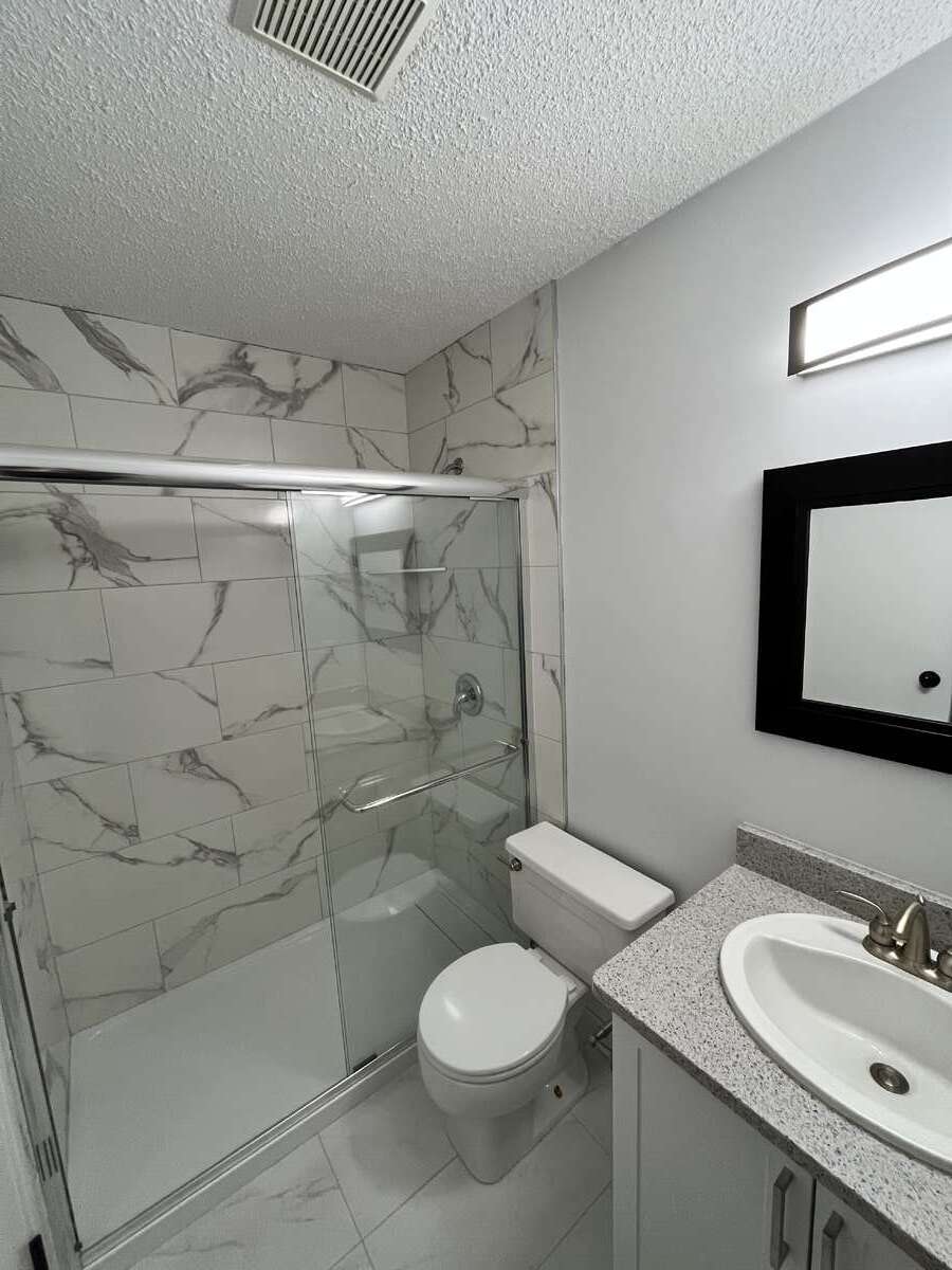 Master bath with walk-in shower.