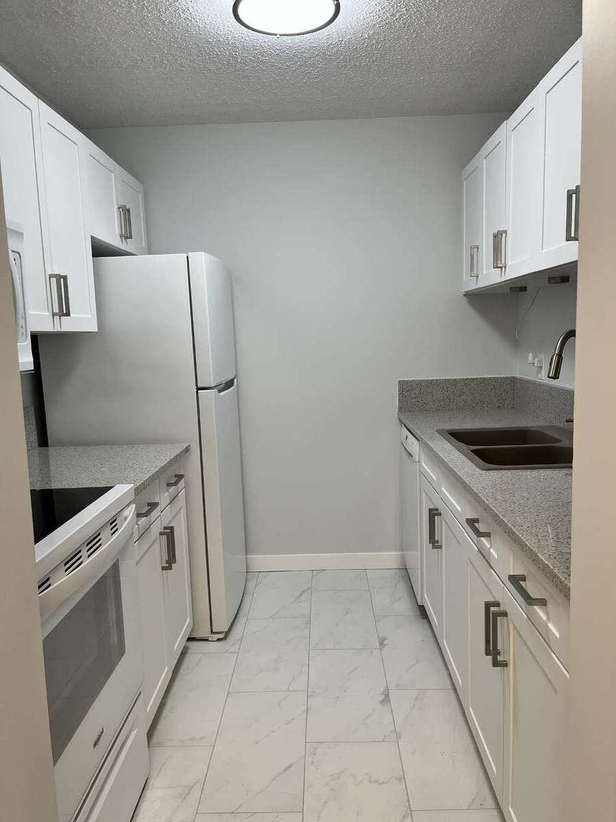 Kitchen with new self cleaning oven.