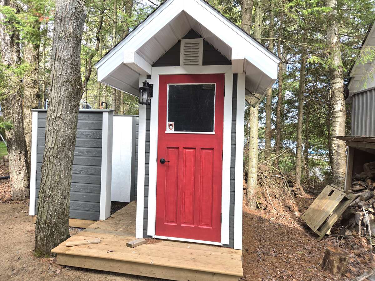 Outhouse with outdoor shower