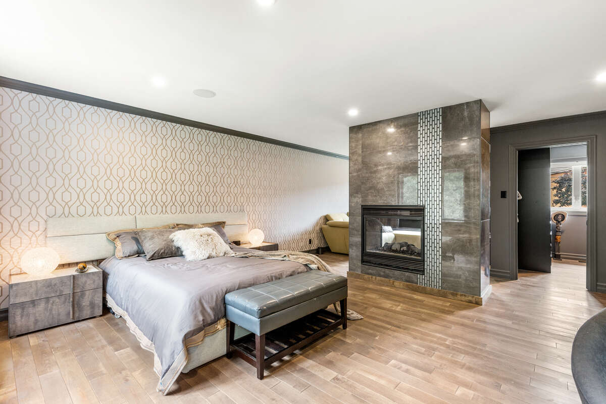 “Luxury Primary Bedroom – Bright, Spacious, and Inviting”