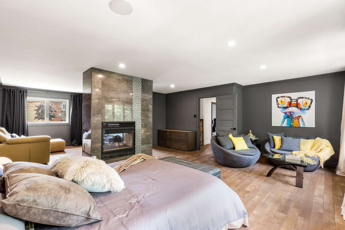 “Luxury Primary Bedroom – Bright, Spacious, and Inviting”