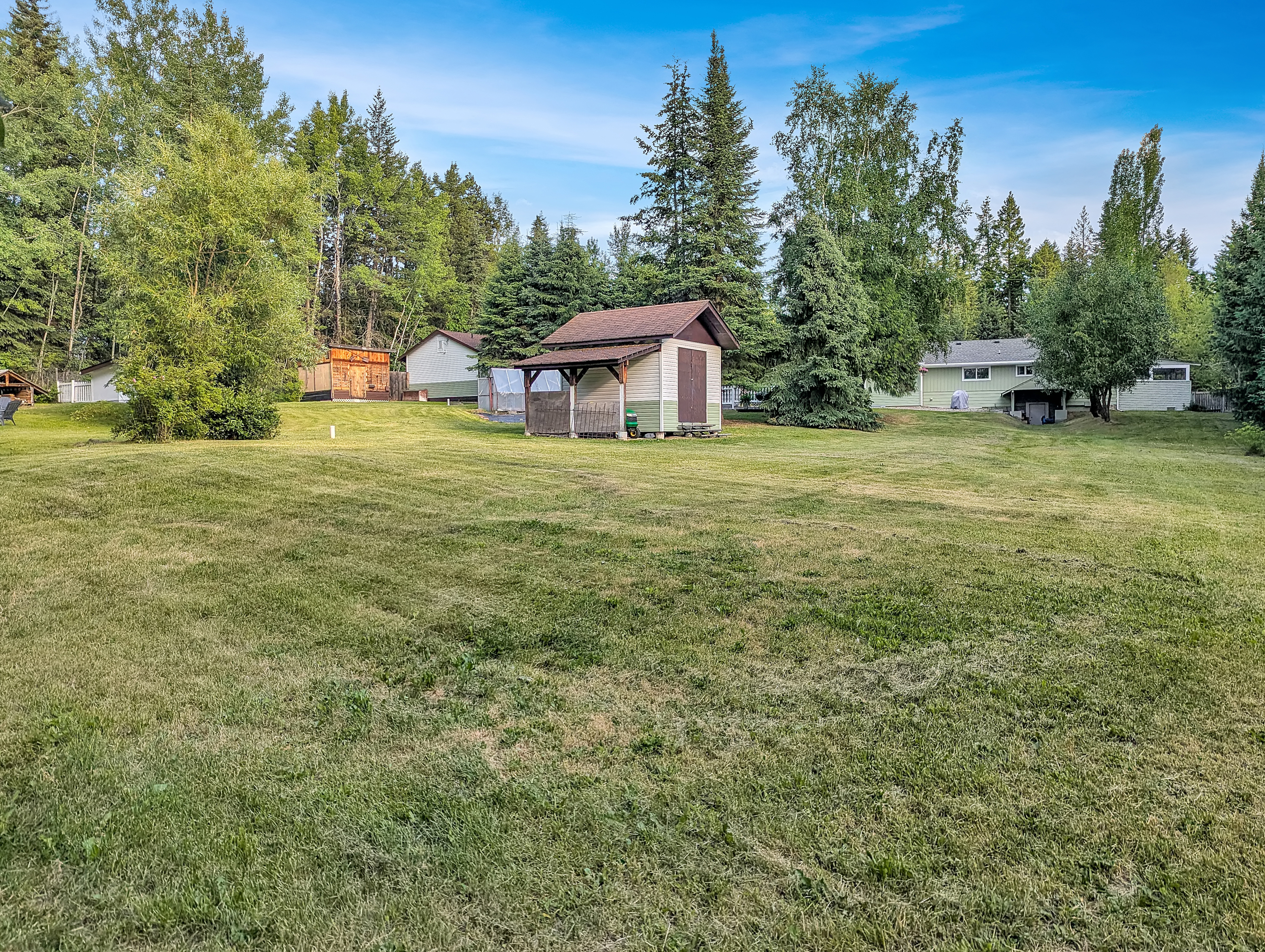 Two Detached Homes on a Private 1-Acre Property