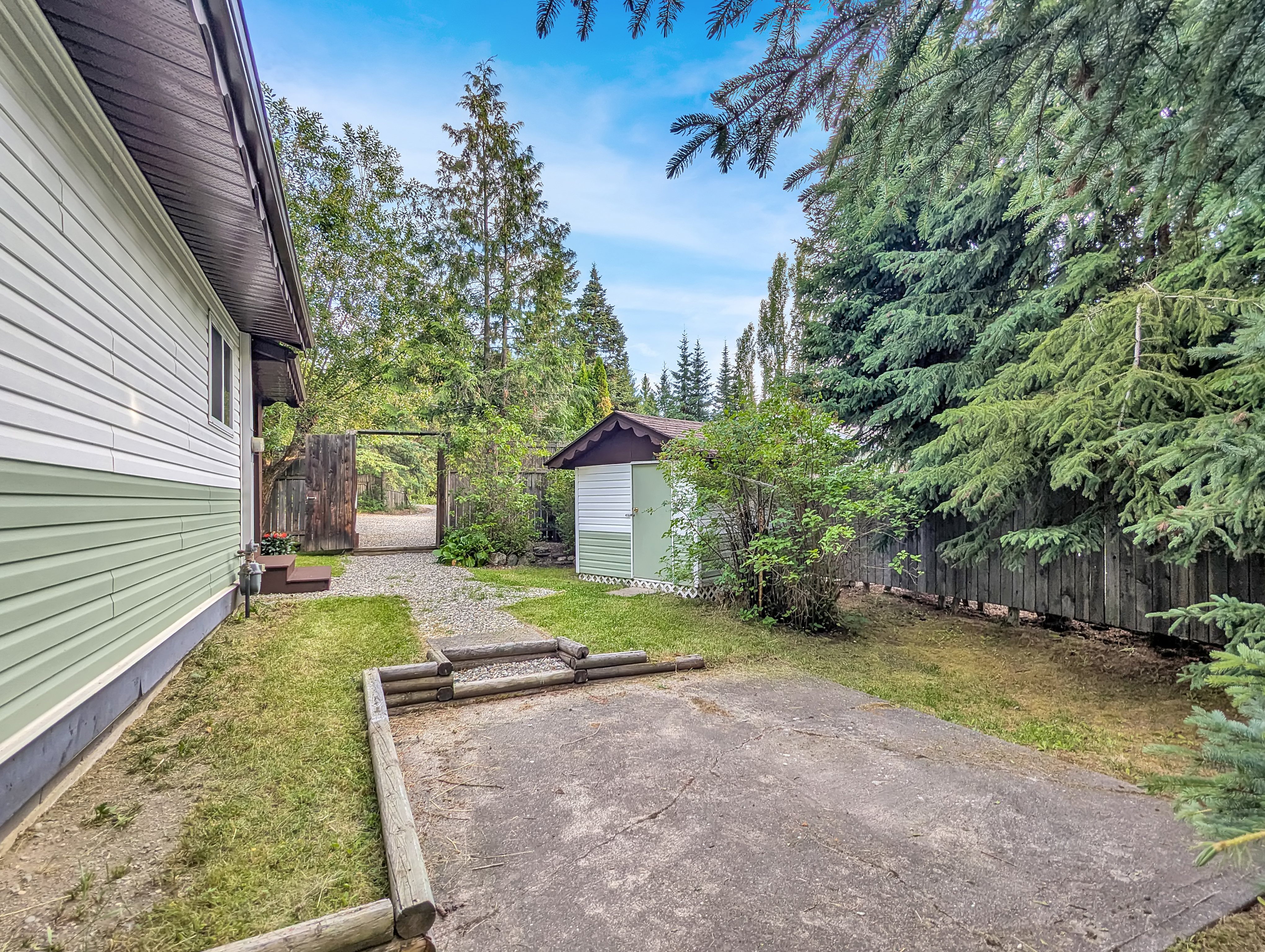 Two Detached Homes on a Private 1-Acre Property