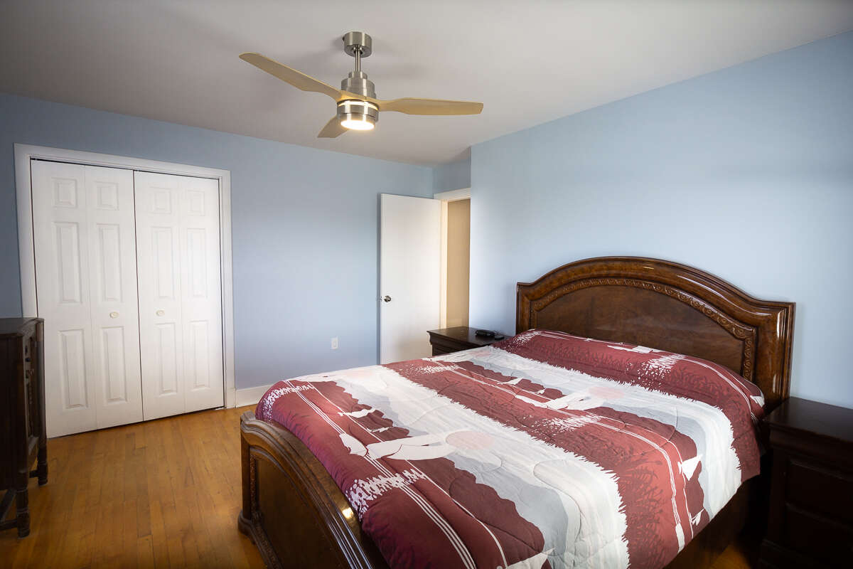 Large bright primary bedroom.