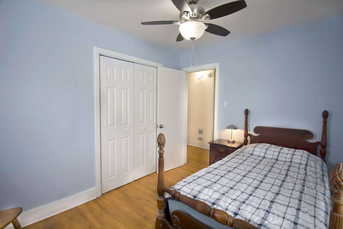 Another bright comfortable upstairs bedroom.