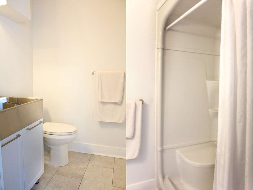 Main floor 3 piece bathroom and laundry with cathedral ceiling.