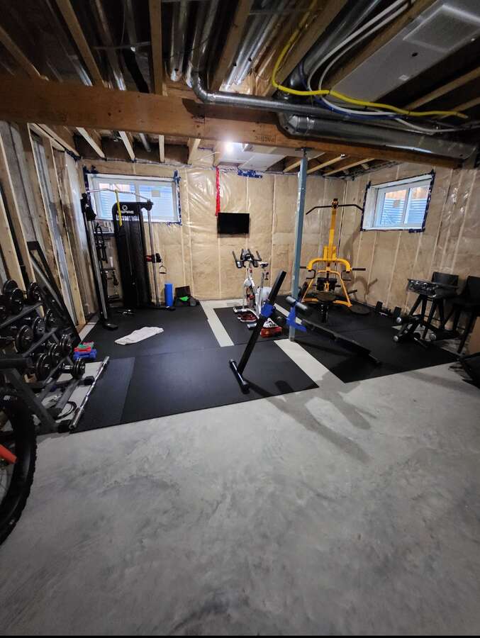 unfinished basement which has partial drywall