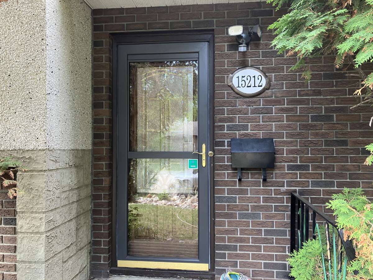 Front Entrance - screen/storm door & motion-sensor security light