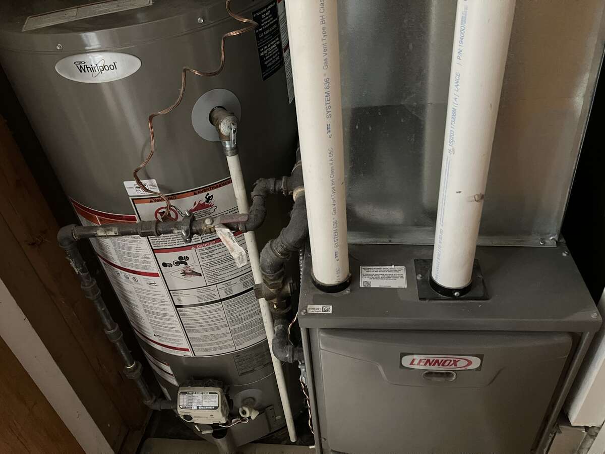 Energy-efficient furnace and oversize water tank