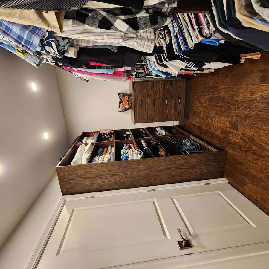 Huge Walk In Closet Complete with Dressers.