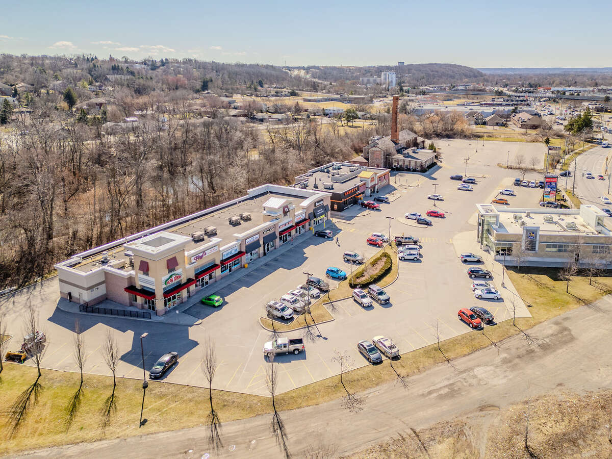 Nearby restaurants -- Harvey's, Swiss Chalet, The Keg, sushi, breakfast restaurants, Royal Bank.