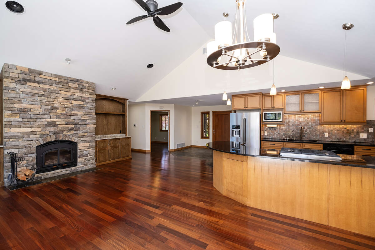 Open Great Room, dining room and kitchen with front entrance