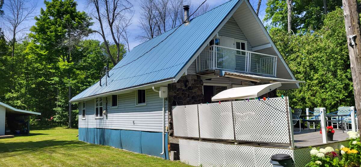 Cottage with a third bedroom's balcony.