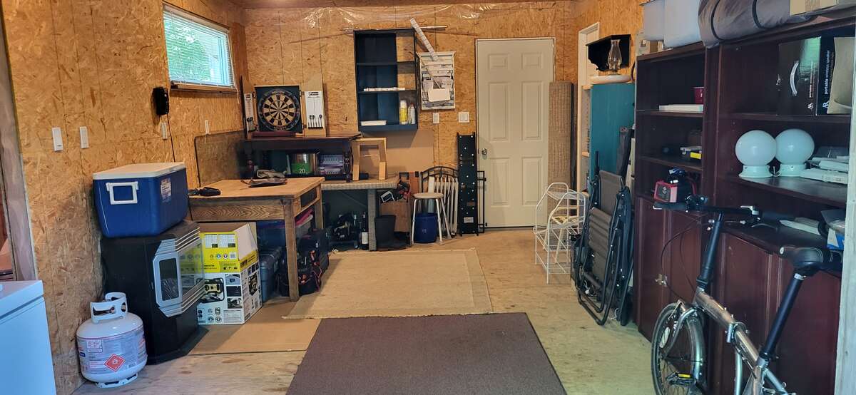 Large Bunkie. Third room with a garage door.