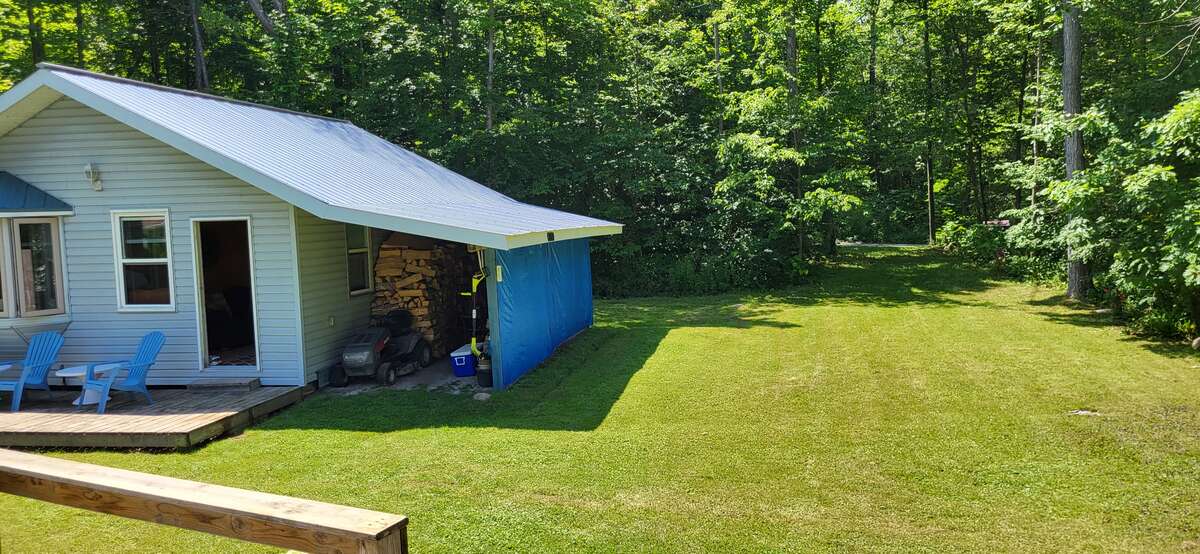 Back side of lot with an entrance from Snake Island road. Large Bunkie.