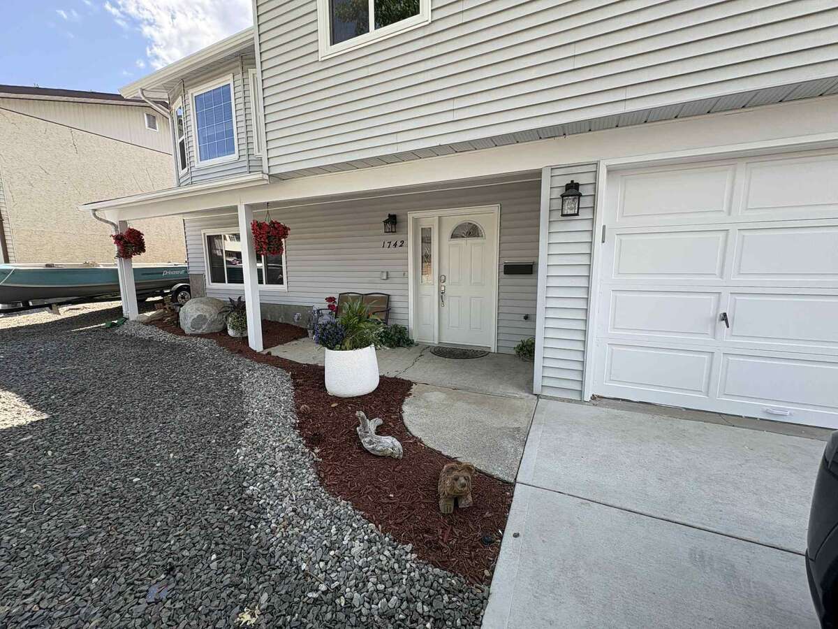 front low maintenance scaping and lots of parking