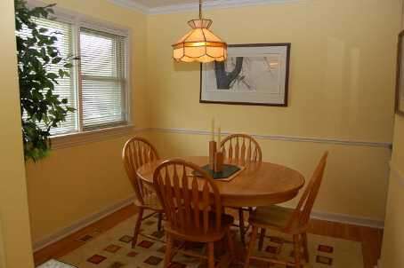 Bright and charming brick bungalow on large lot