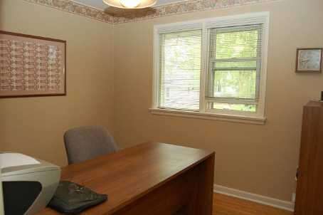 Bright and charming brick bungalow on large lot